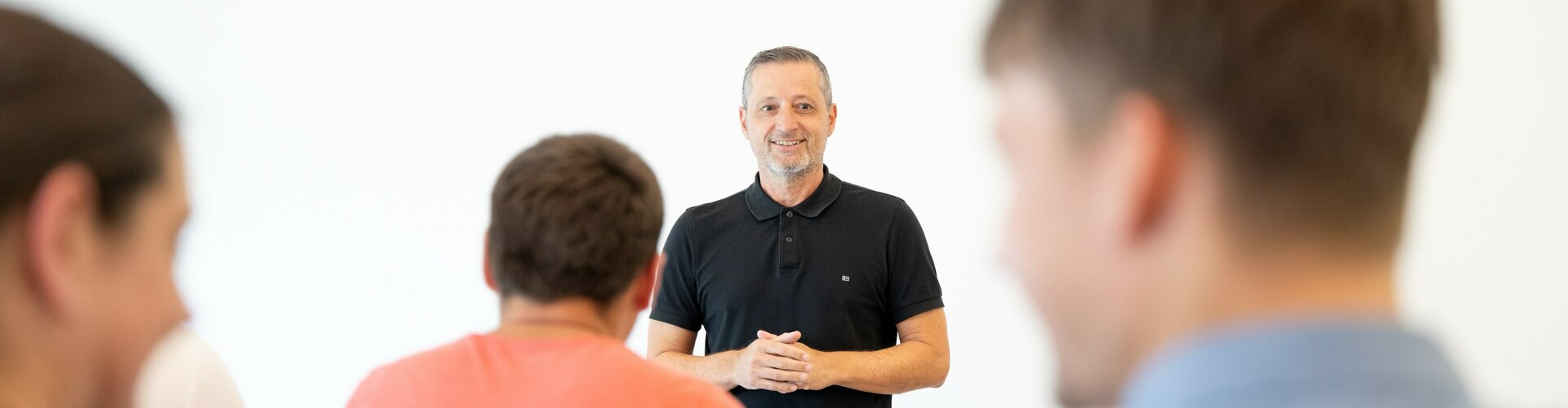 Bildausschnitt mit einer Tagungsgruppe